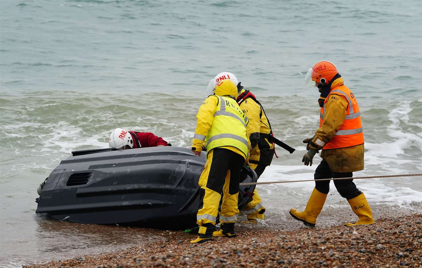 A jet ski thought to have been used in a migrant crossing is brought in to Dungeness, Kent, by the RNLI after being intercepted in the Channel (Gareth Fuller/PA)