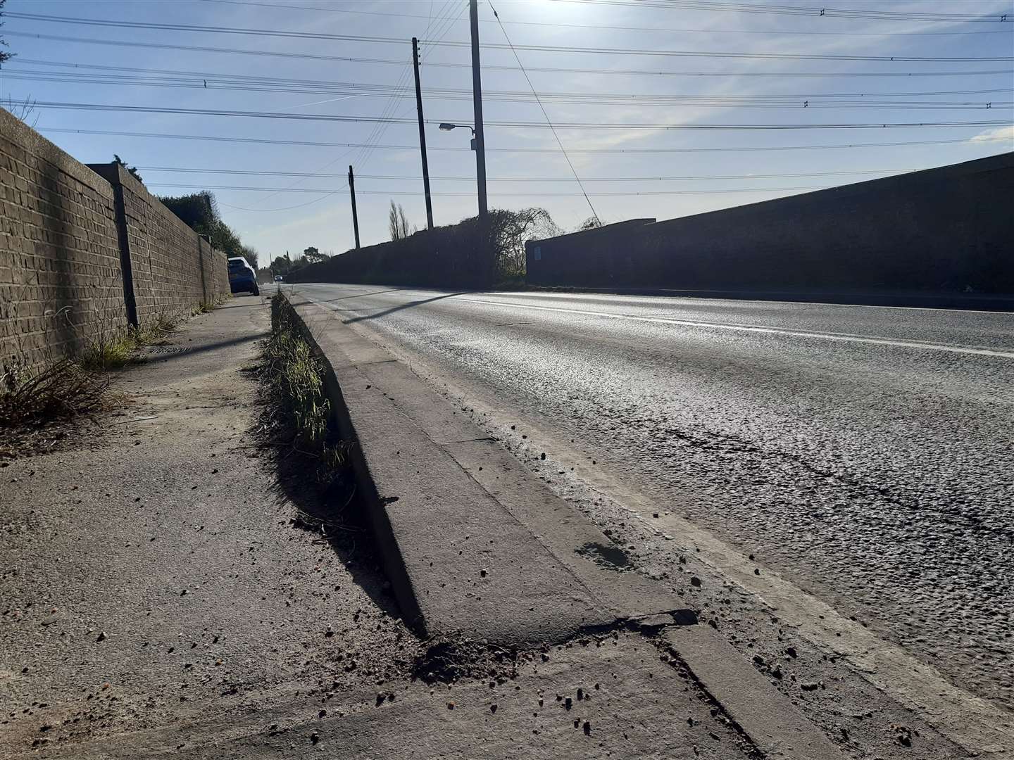 The damaged Range Rover was dumped on a rail bridge in Station Road, Cliffe