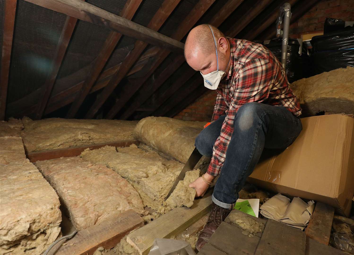 Households will receive grants of up to £10,000 to make their homes more energy efficient (Philip Toscano/PA)