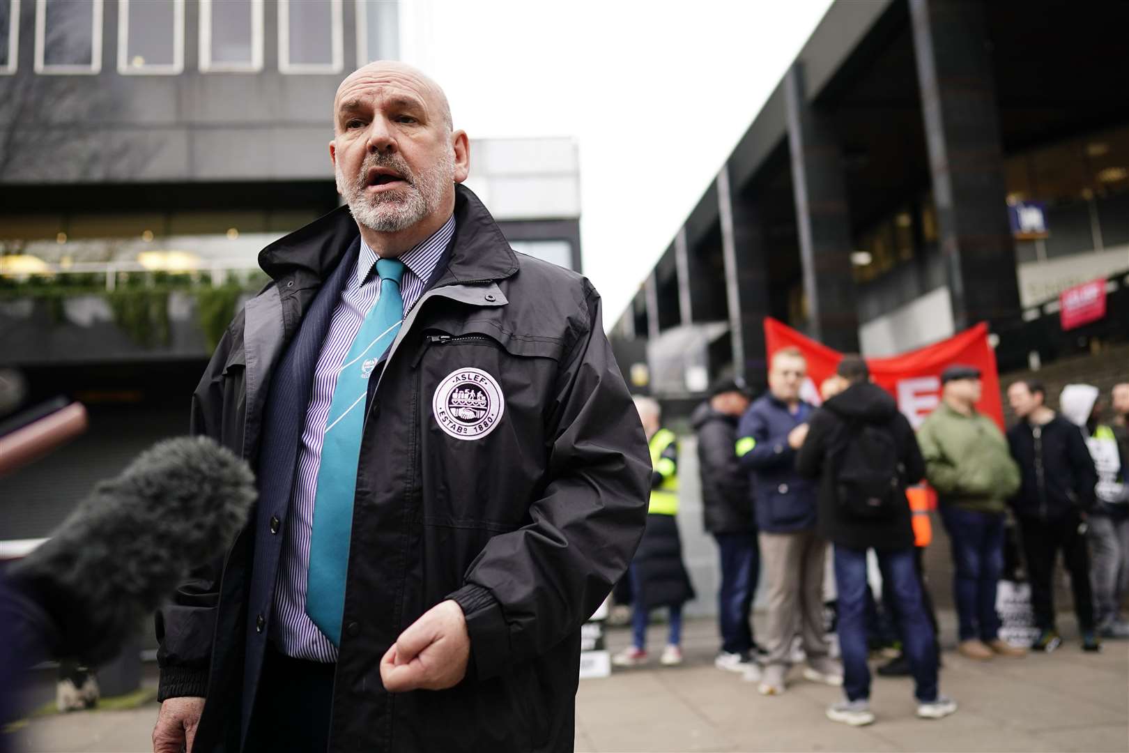 Aslef general secretary Mick Whelan on a picket line during strike action earlier this month (PA)