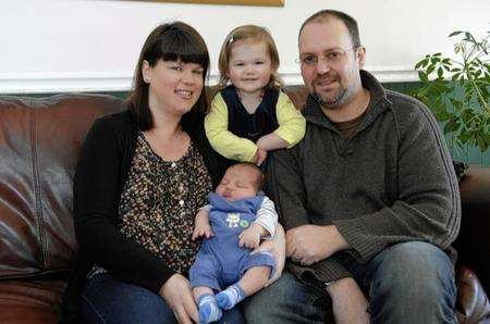 The Corbett family with 12 pound 8 ounce baby Charlie. 22 Hurst Close, Staplehurst. What a whopper, mum Virginia Corbett holds up 12 pound 8 ounce Charlie.