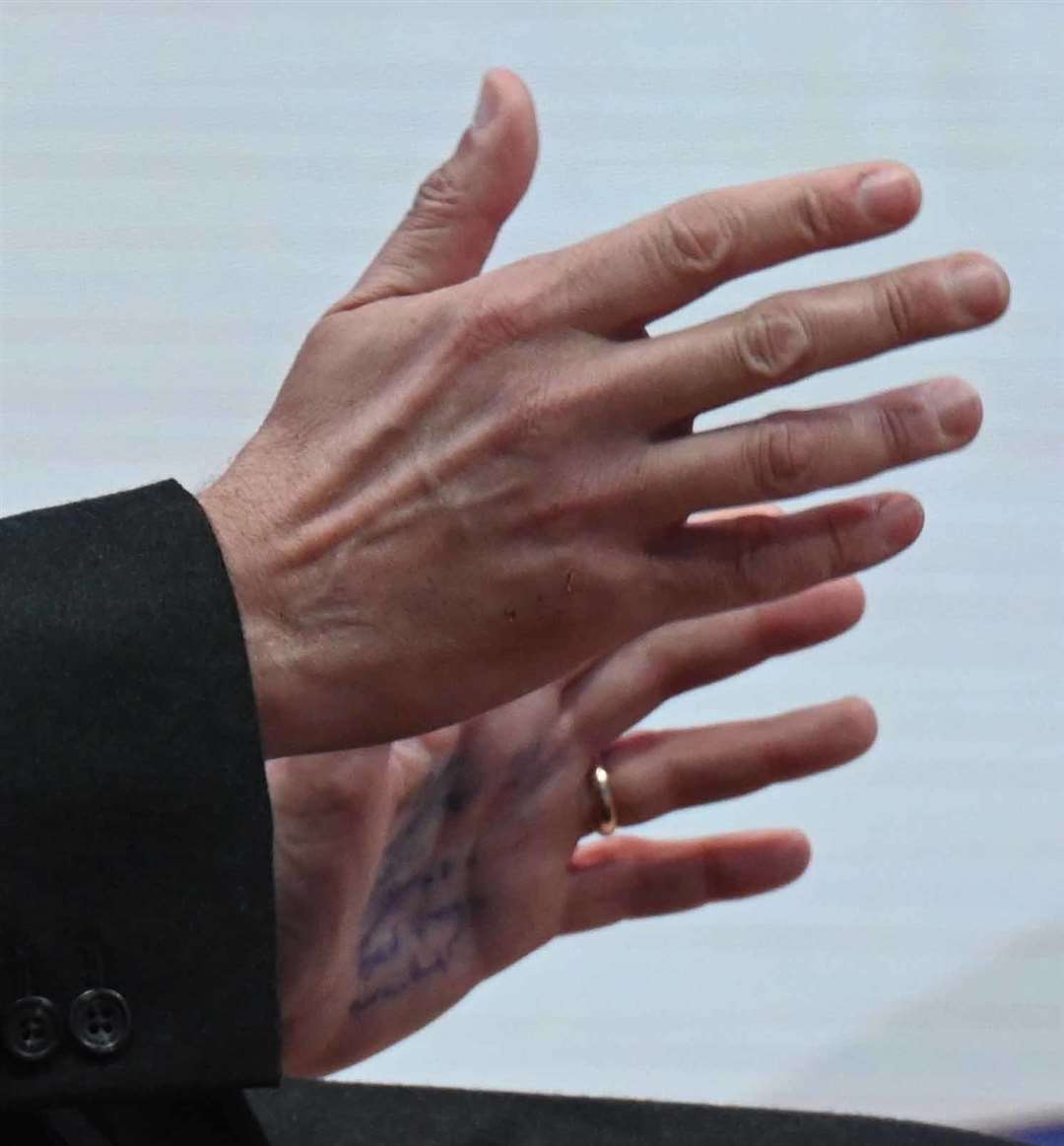 Tory party chairman Greg Hands with writing on his palm during an interview on Sunday With Laura Kuenssberg (BBC/PA)