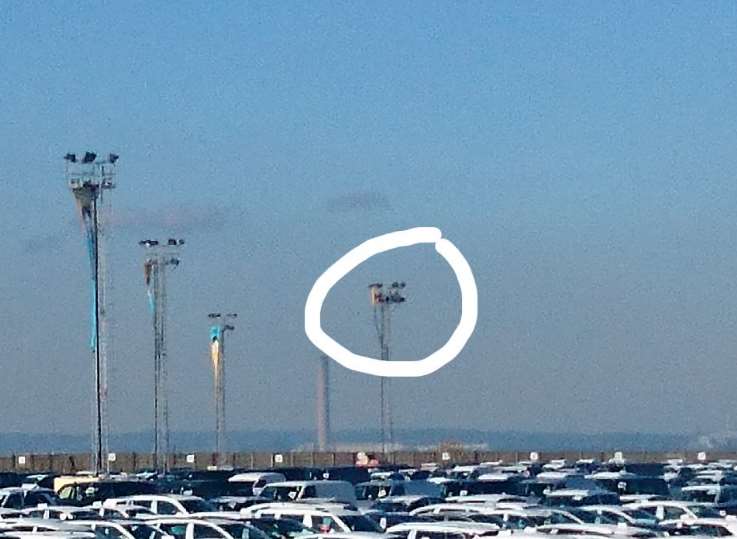 Two protesters are still positioned on one of the lighting gantries in the Sheerness import park, where they spent the night