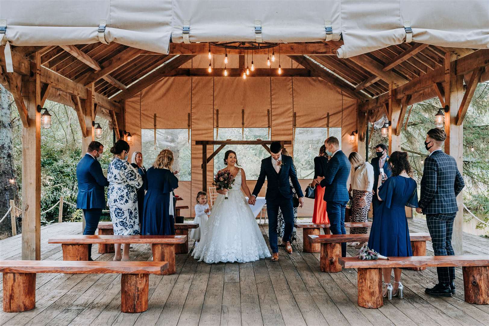 TYING THE KNOT... Matthew and Ellie with their 15 Hackness Grange guests. All photos: M&G Wedding Photography