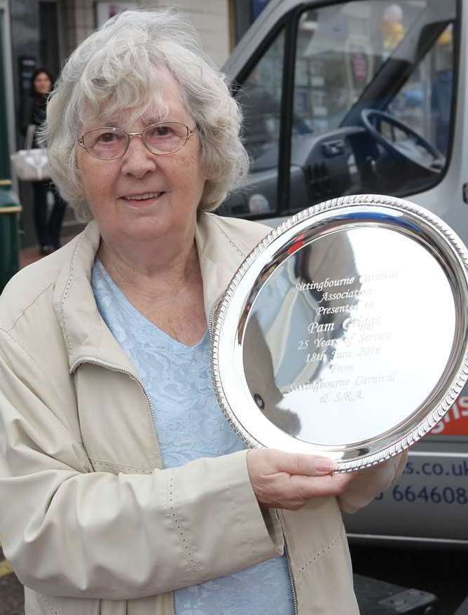 Pam Griggs with a shield to mark serving 25 years of chairing the Sittingbourne Carnival Association. Picture: John Westhrop