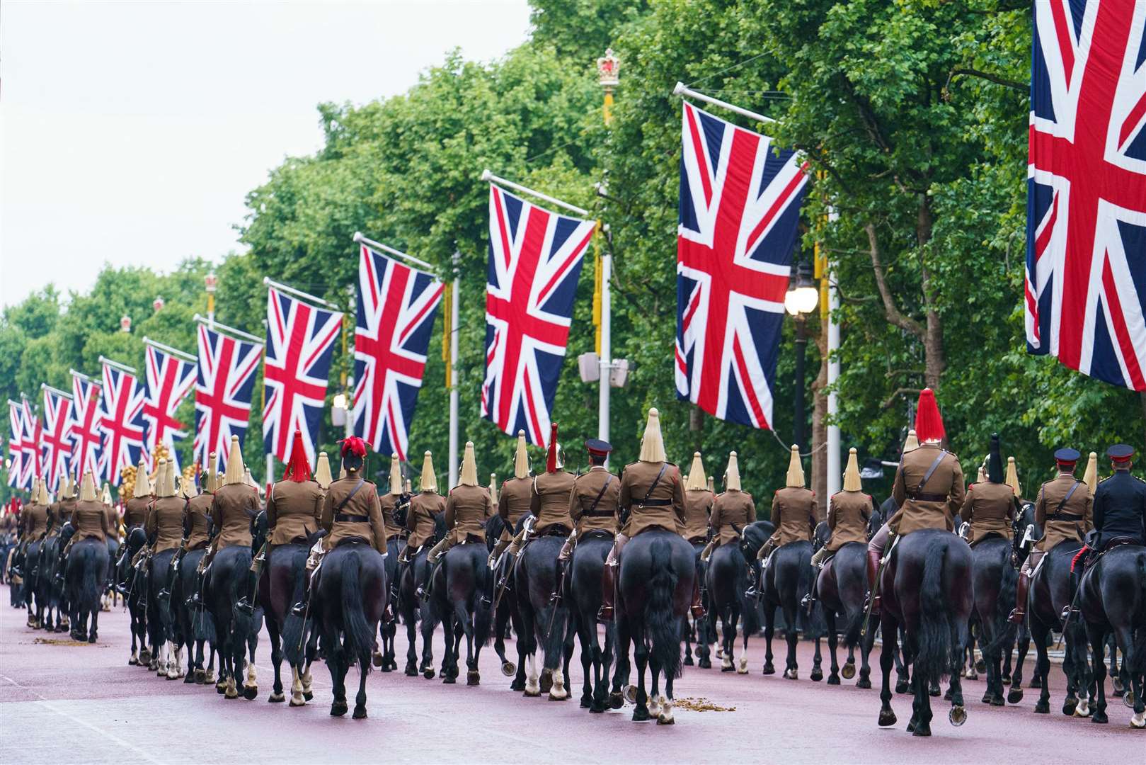 Troops of the Household Cavalry on The Mall during an early morning rehearsal ahead of Sunday’s Platinum Jubilee Pageant (Dominic Lipinski/PA)