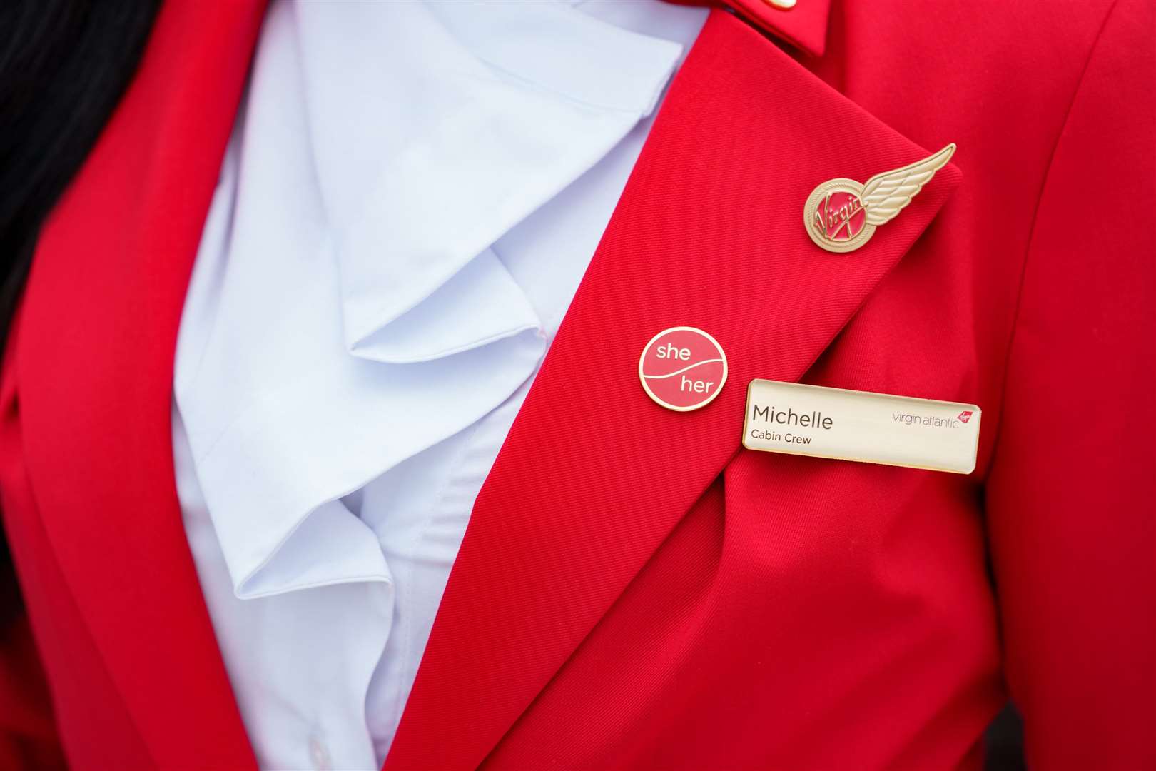 Staff can wear optional pronoun badges (Virgin Atlantic/PA)