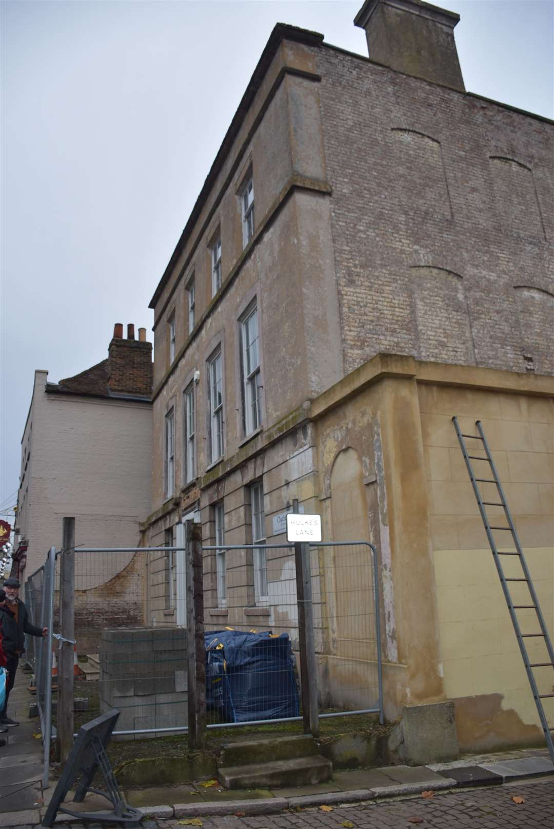 The shop front of the building before the project began to re-build the original front porch. Photo: Sheila Featherstone