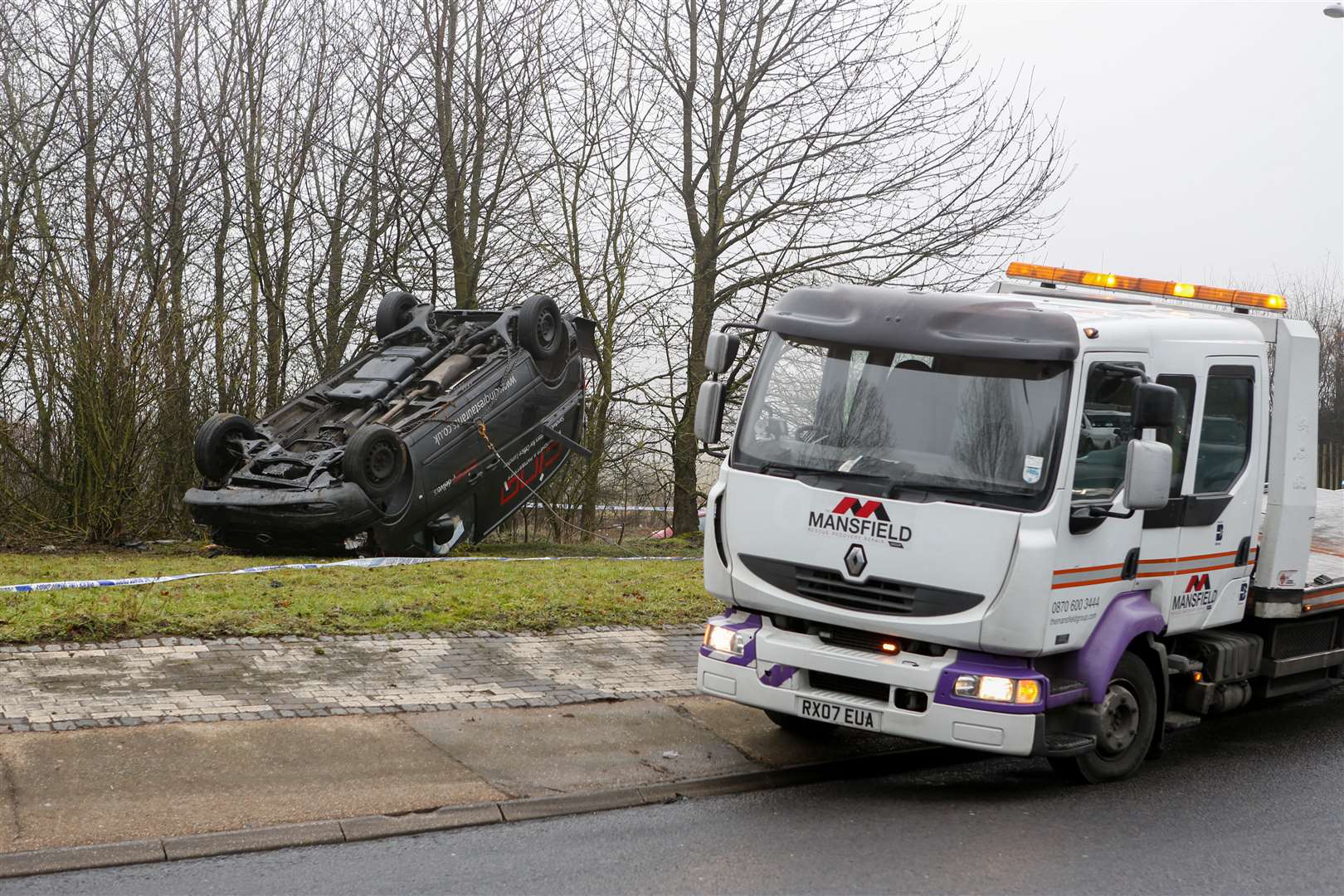 Crash scene where a van landed upside down at the A228 roundabout