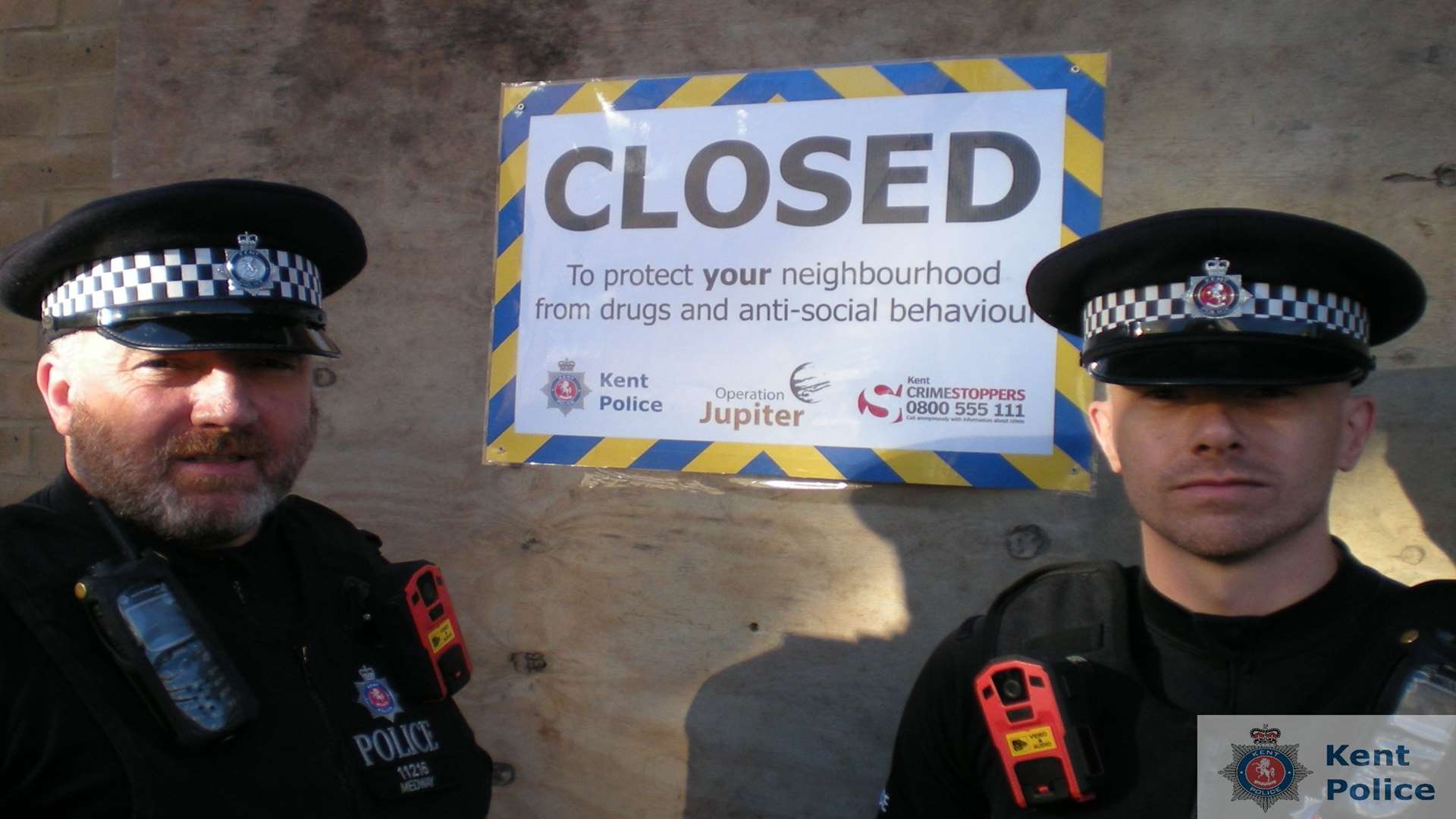 PC Paul Riley and PC Barry Lewis outside the property in Magpie Hall Road. Picture: Kent Police