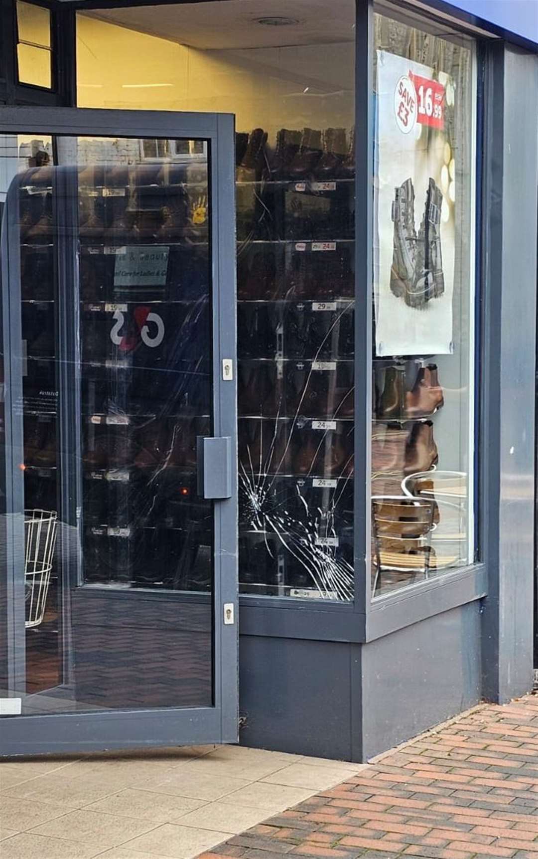 Damage caused to a window at Shoezone in Sittingbourne High Street