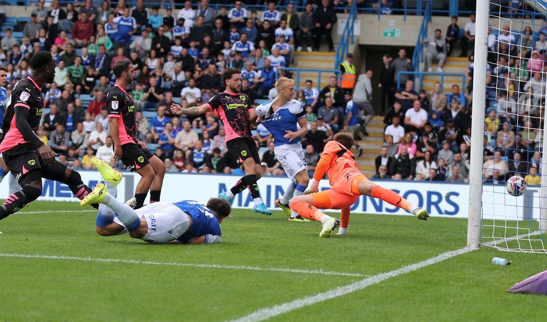 Robbie McKenzie heads in the opener for Gillingham Picture: @Julian_KPI