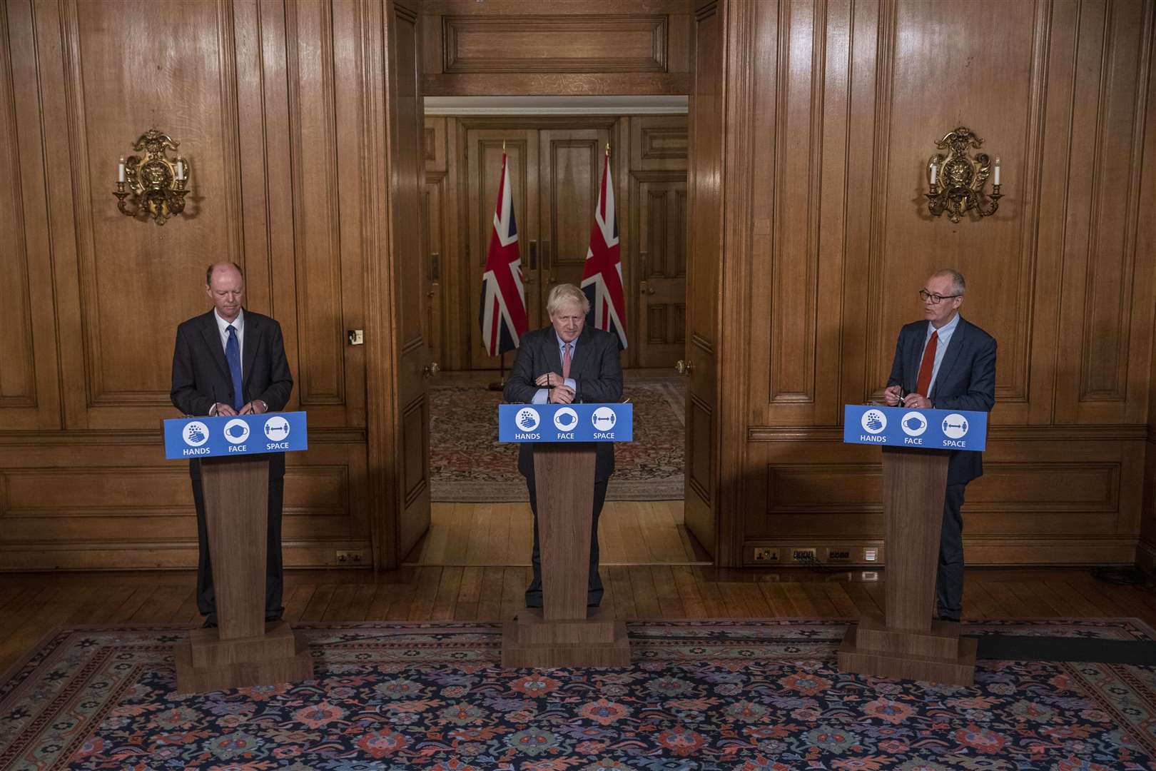 Professor Chris Whitty, Prime Minister Boris Johnson and Sir Patrick Vallance during a media briefing in Downing Street (Jack Hill/The Times/PA)