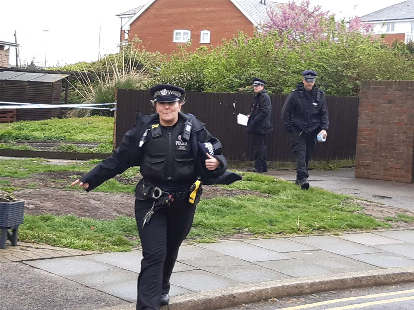 Officers at the scene in Belmont Road
