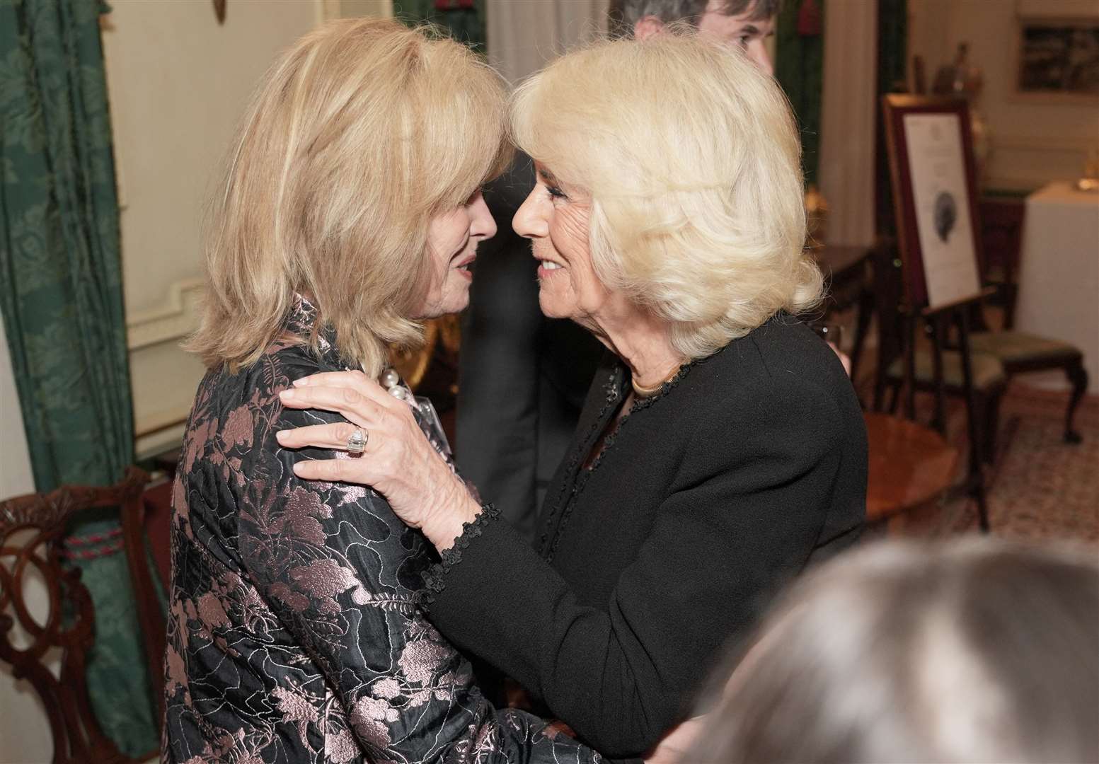 The Queen speaks to Dame Joanna Lumley (Yui Mok/PA)