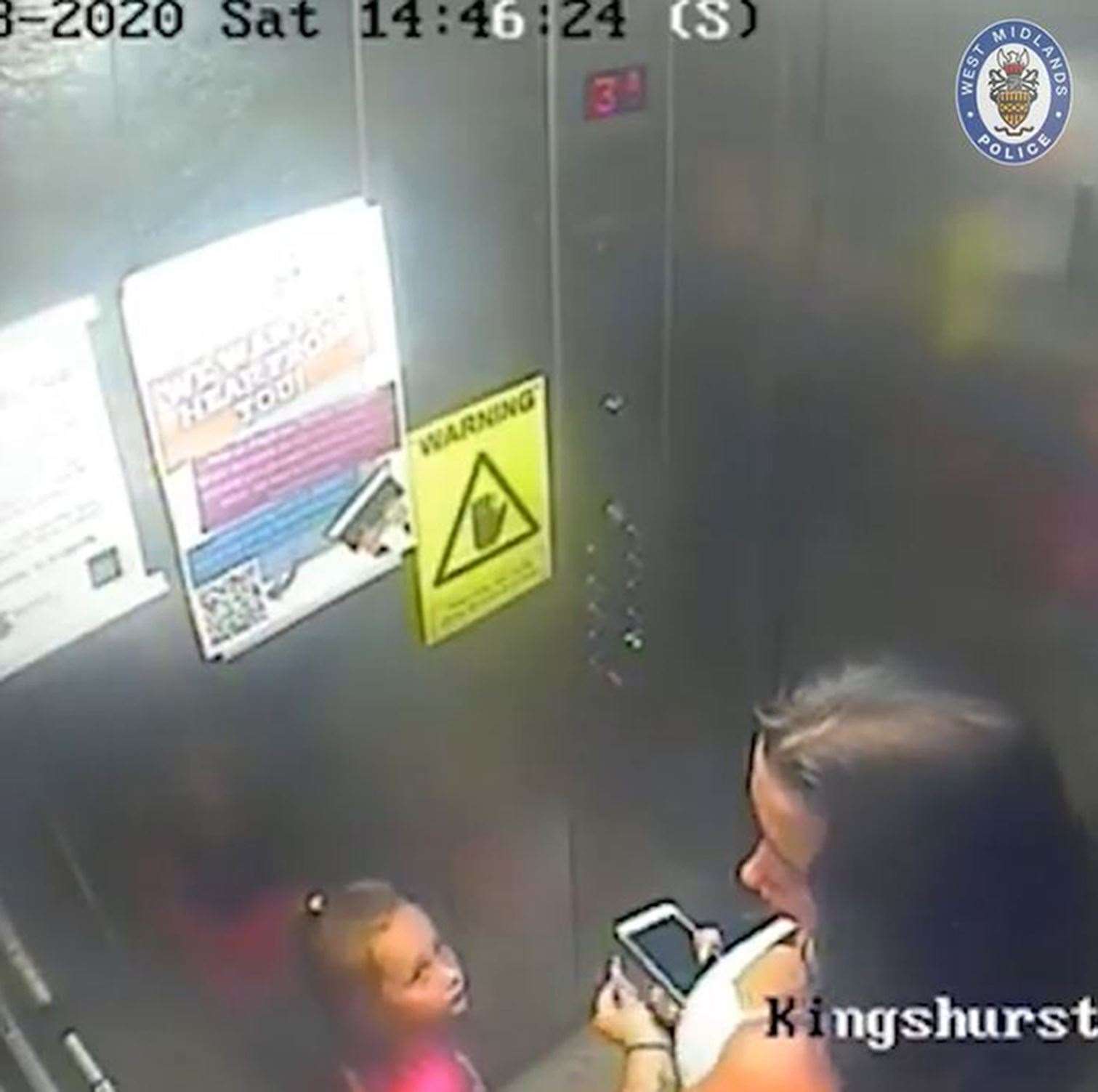 Kaylee-Jade gazes up at her disinterested mother in the lift where they lived, hours before she was killed (West Midlands Police/PA)