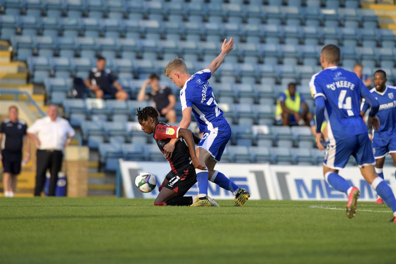 Glaswegian boss Steve Evans looks on as Celtic loan kid Scott Robertson gets stuck in Picture: Barry Goodwin