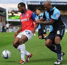 Myles Weston holds the ball up