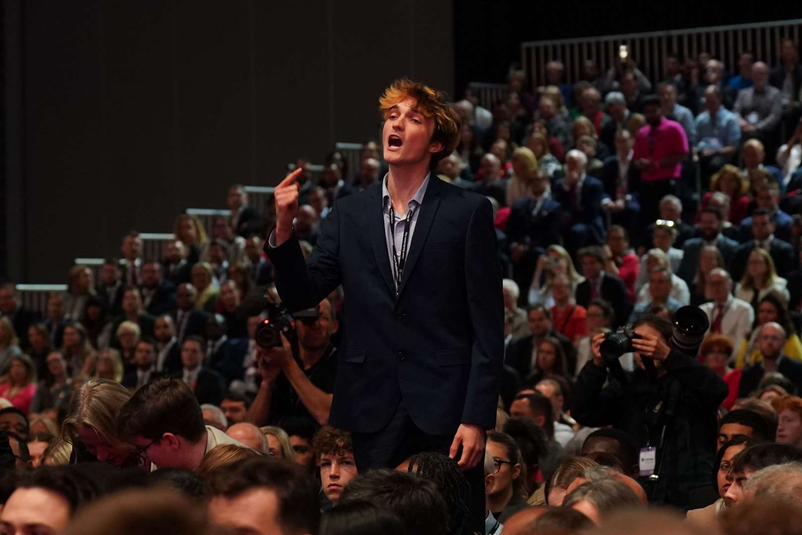 A heckler interrupts Chancellor of the Exchequer Rachel Reeves (Stefan Rousseau/PA)