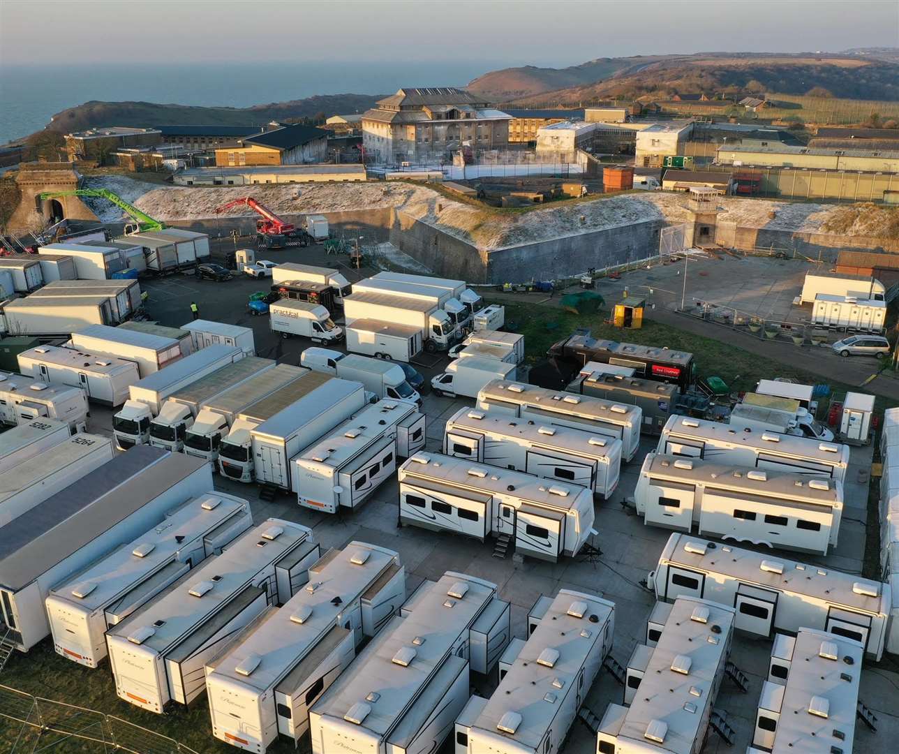 The mass of lorries, caravans and other equipment for the making of the Marvel film Kraven the Hunter at The Citadel in Dover