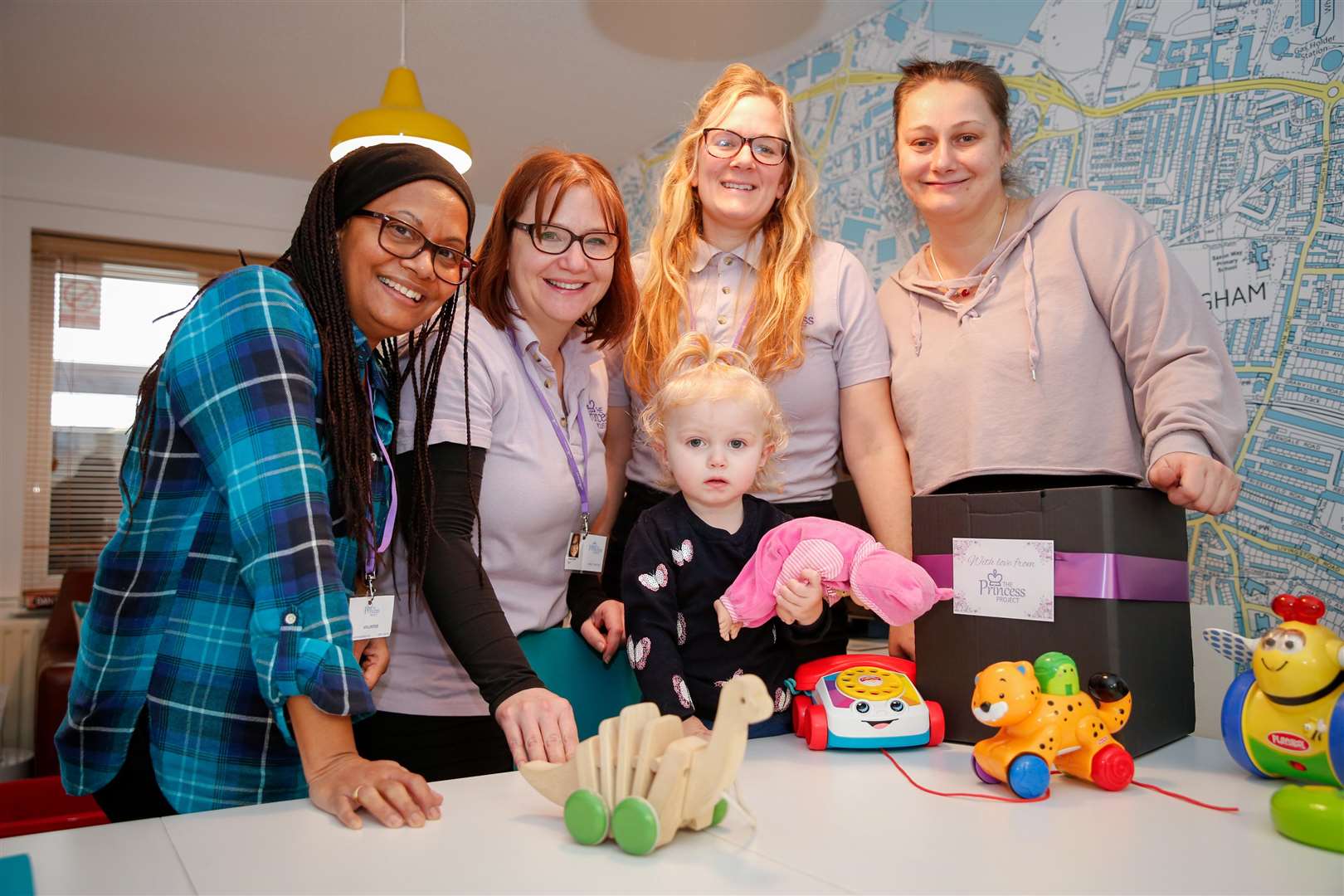 The Princess Project, The Community Hub, The Vineries, Gillingham. 18 month old Daisy-Rose Steel with Bruinda Harvey, Emma Tanner and Beth Thompson from the Princess Project and mum Freda Payne. Picture: Matthew Walker. (6374784)