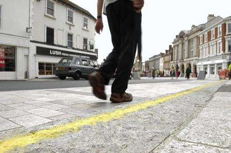 New yellow lines are added to the new invisible kerbs to help pedestrians spot them. King Street, Maidstone