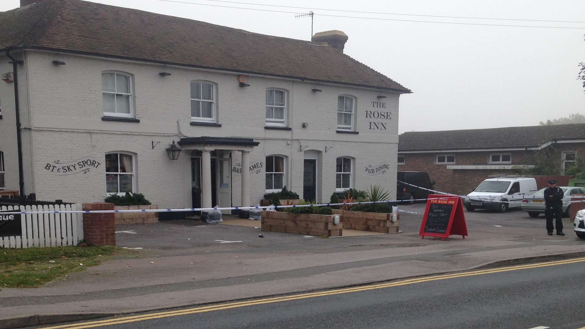 A police officer standing guard outside The Rose in Kennington at the time of the incident