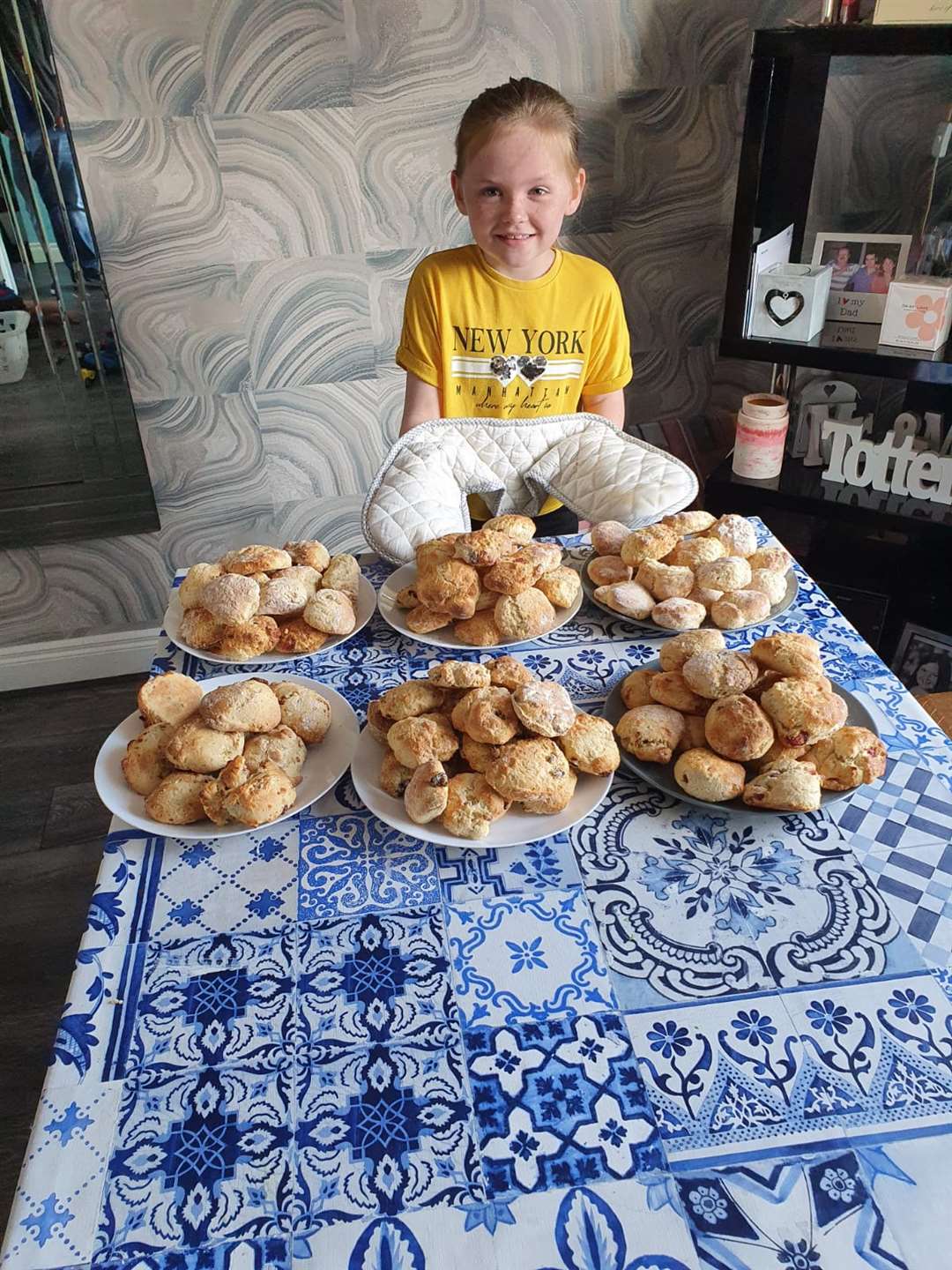 Riah Totten, 8, from Belfast, has been baking hundreds of scones for the elderly and vulnerable in local communities (Family handout/PA)
