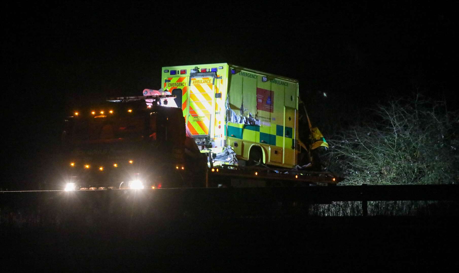 The ambulance being removed from the crash scene