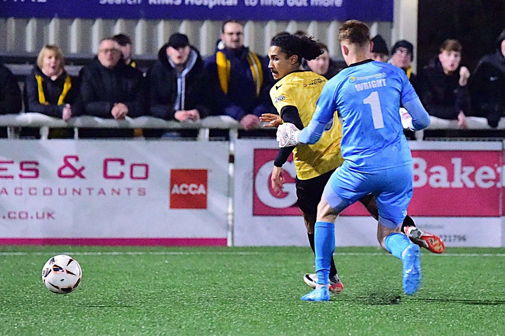 Aaron Blair rounds stranded goalkeeper Joseph Wright for Maidstone's third goal against Eastbourne. Picture: Steve Terrell