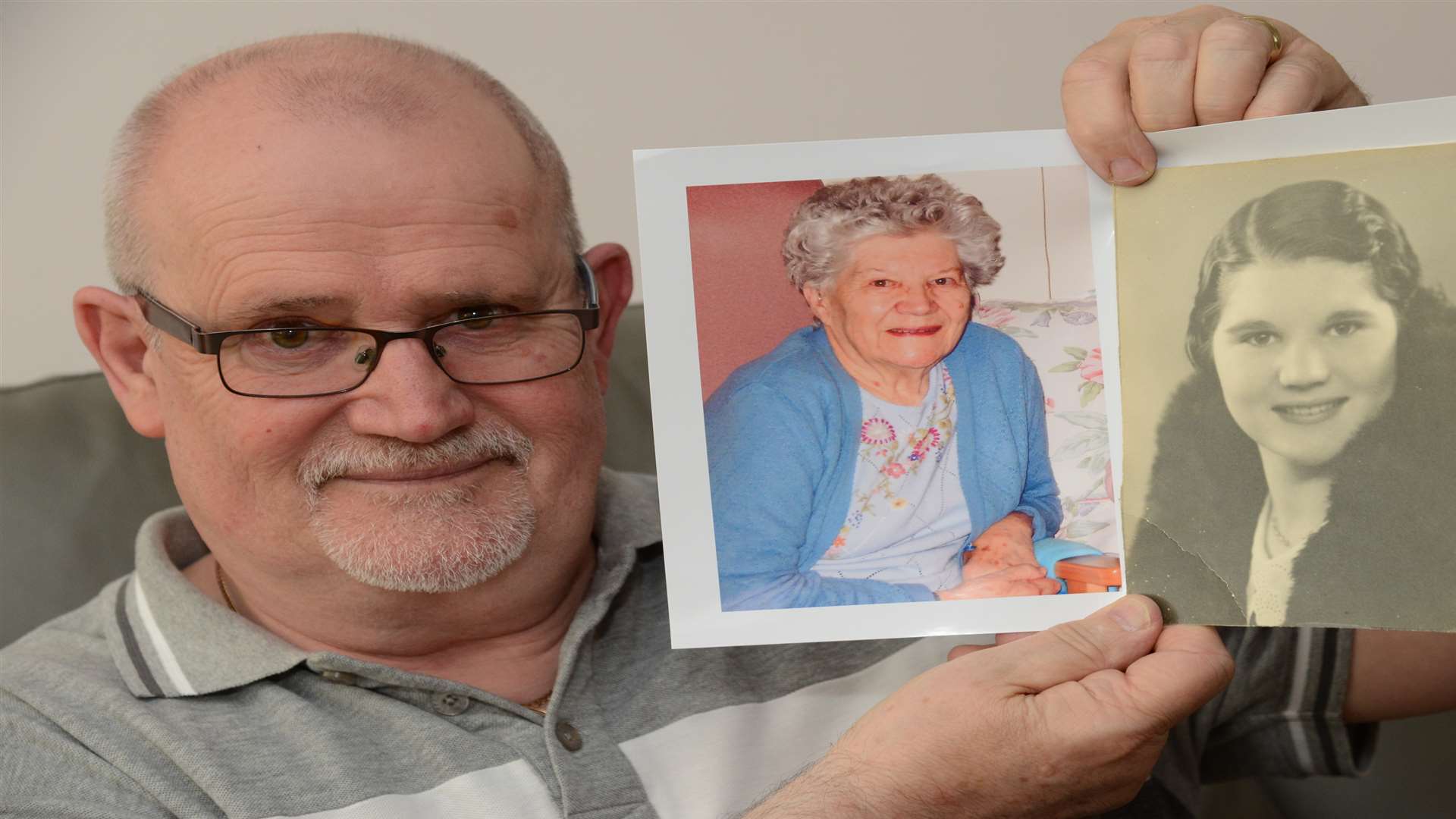 Roger Boxall with pictures of his mum Audrey