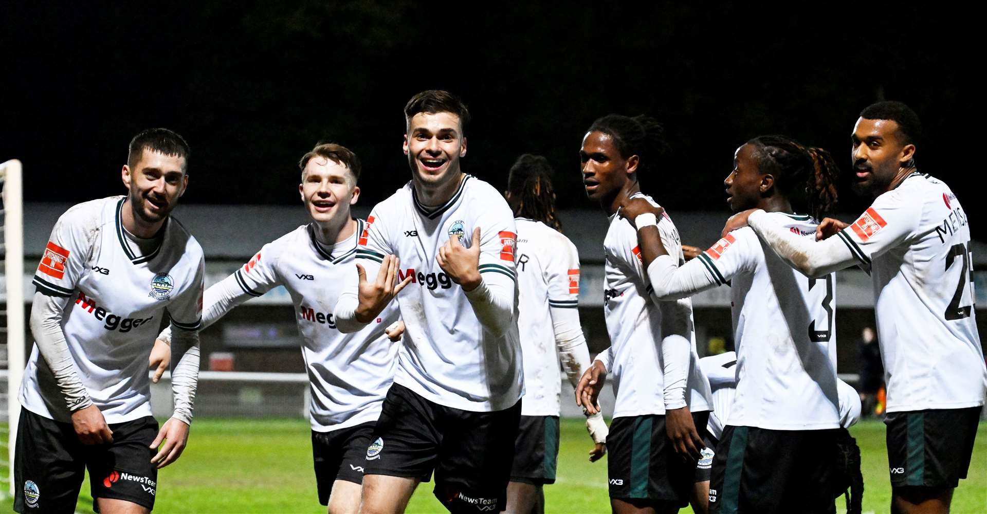 Dover’s players celebrate their third goal. Picture: Barry Goodwin