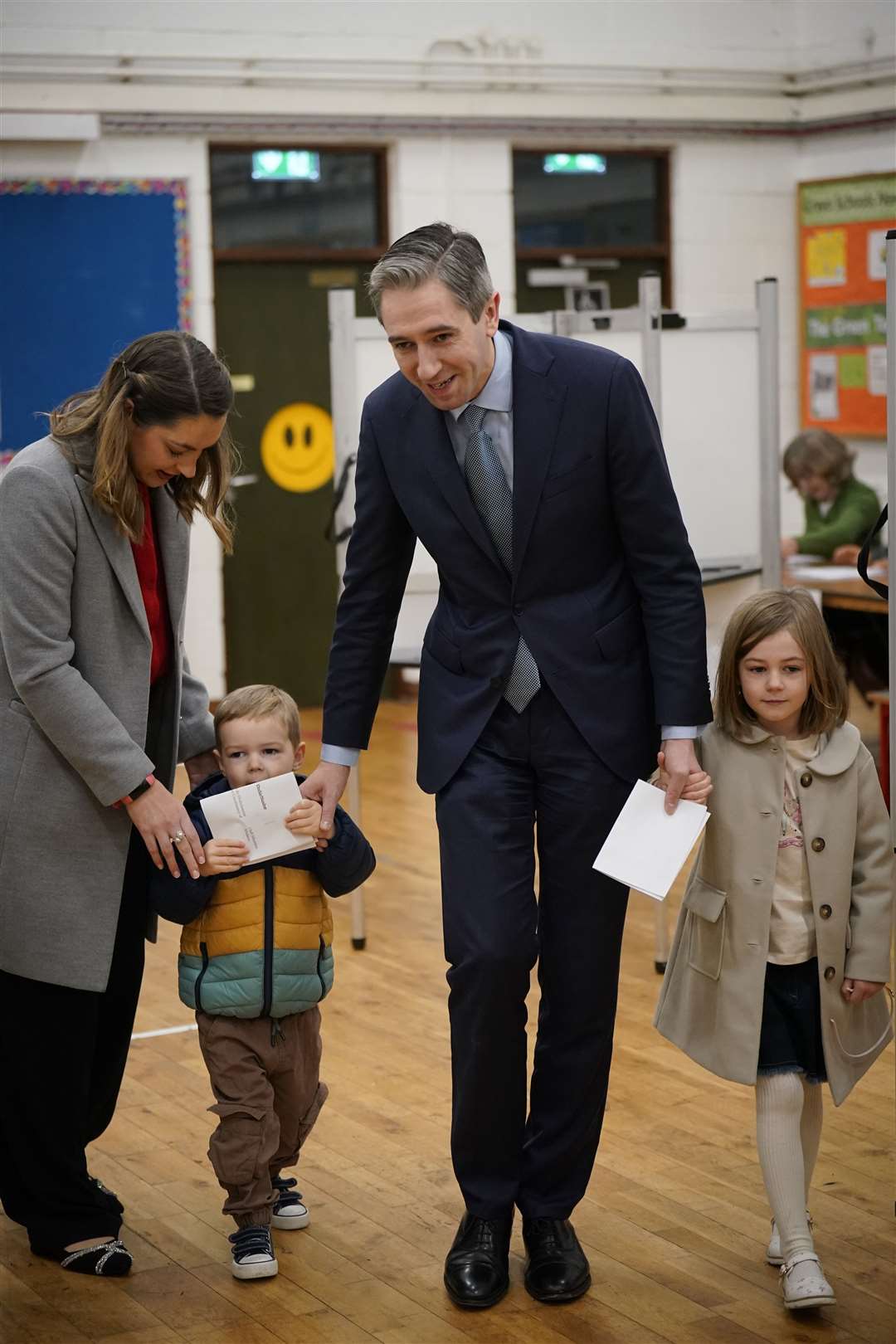 Taoiseach and Fine Gael leader Simon Harris casts his vote at Delgany National School, County Wicklow (Niall Carson/PA)