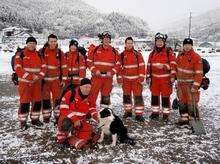 Members of UK-ISAR, including firefighters from Kent, search through the rubble and ruins