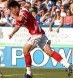 Zheng Zhi celebrates his equaliser. Picture: BARRY GOODWIN