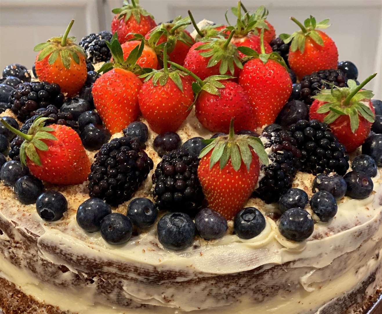 A cake packed full of berries. Picture: The Nuttery