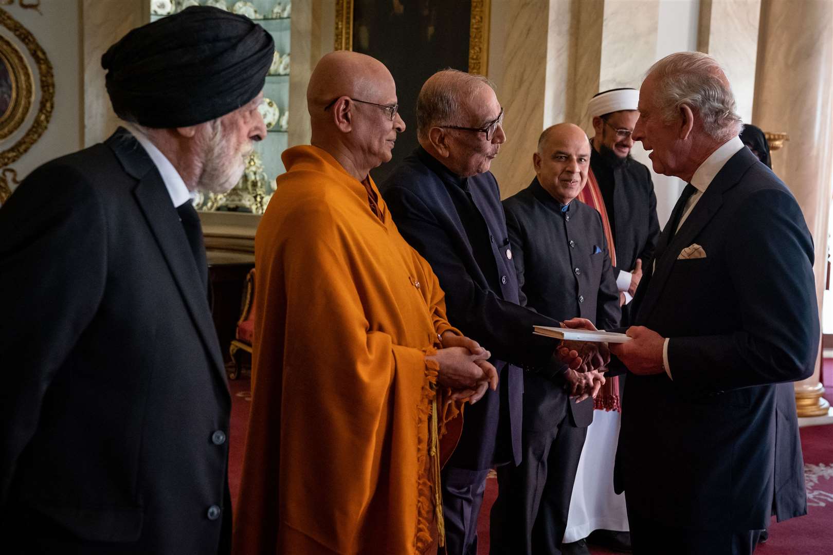 Charles attends a reception with faith leaders (Aaron Chown/PA)