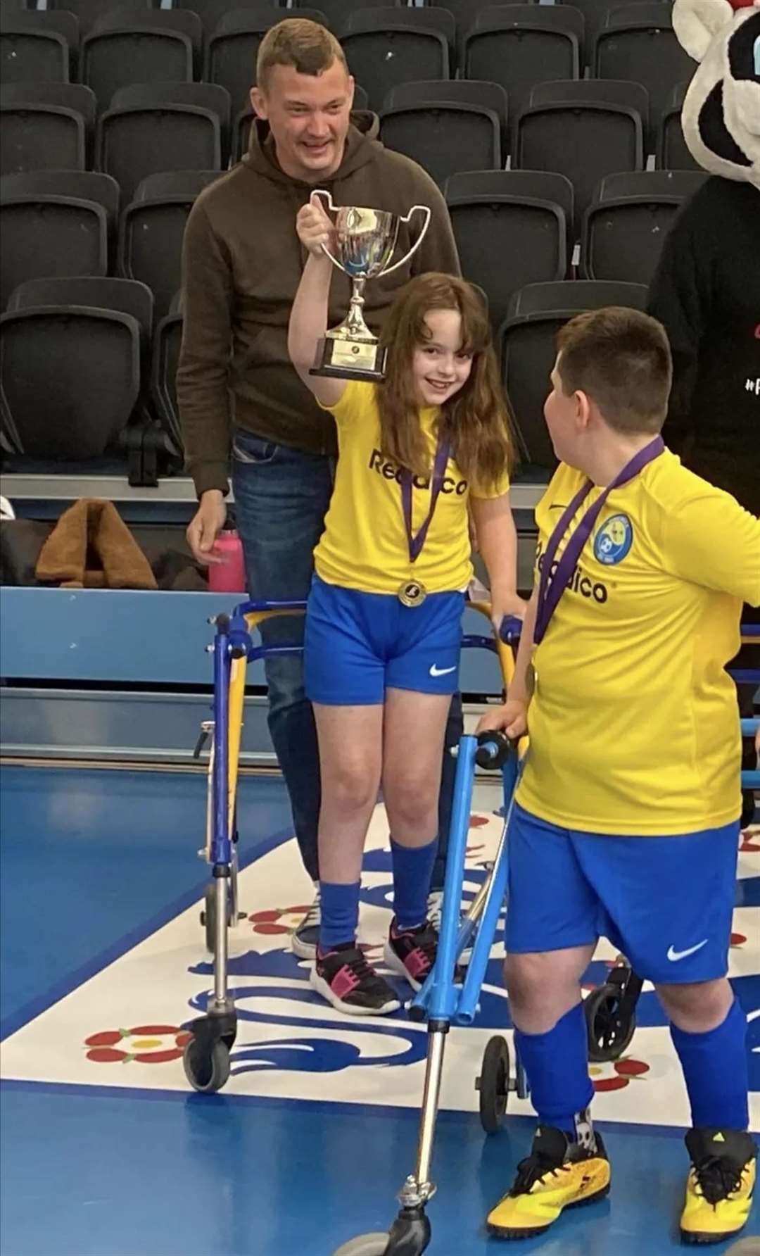 Bella Barton, from Faversham, celebrating a win with her former walking frame football team. Picture: Leigh Turner