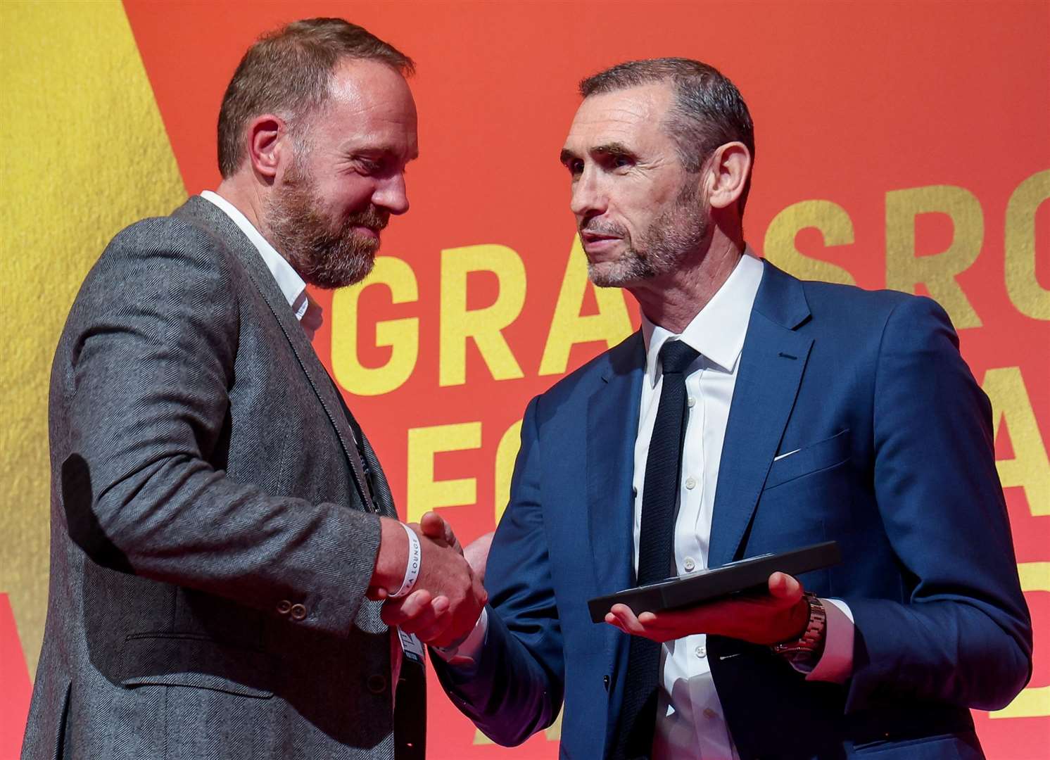 Anchorians FC chairman Leigh Willis is presented with the club's award by legendary former Arsenal and England defender Martin Keown. Picture: Tristan Fewings - The FA/The FA via Getty Images