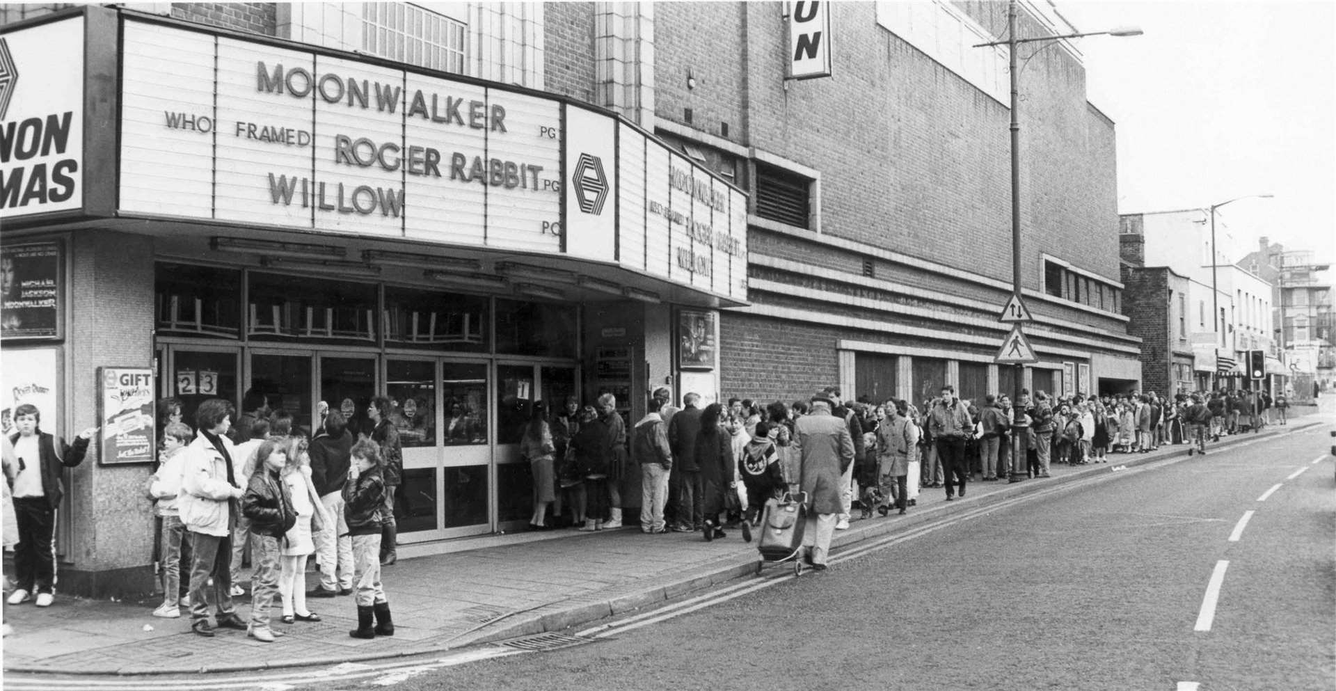 Long queues outside the Cannon Cinema in Chatham High Street were once typical, as this 1989 photograph shows. Picture: Images of Medway book