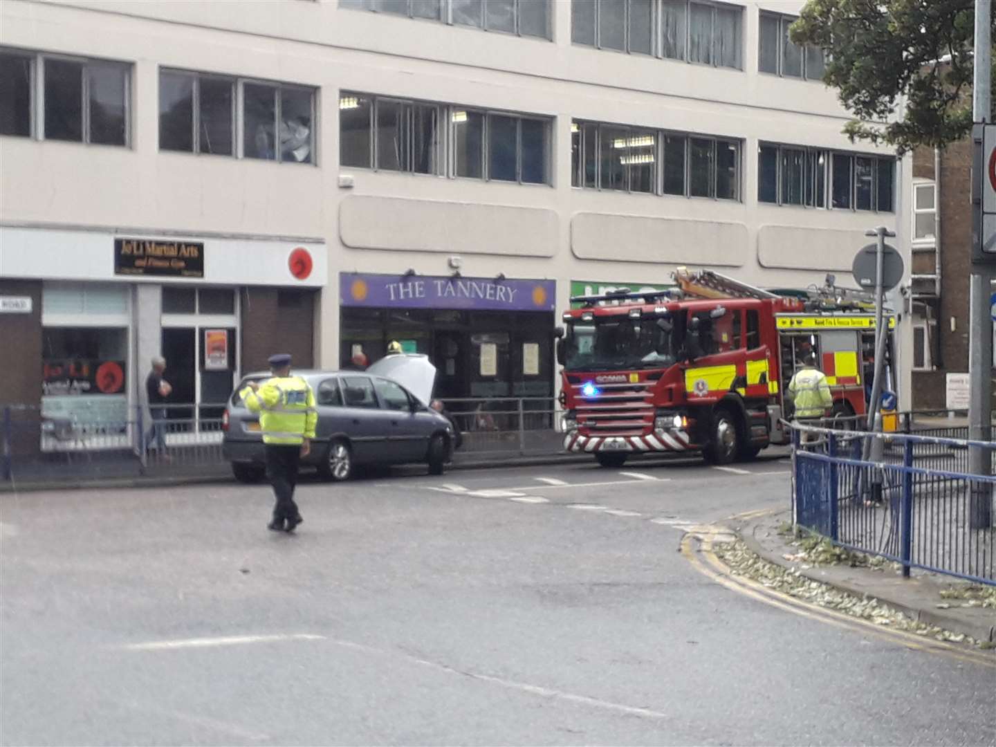 Police and fire attend a car which crashed into railings in Trinity Road, Sheerness, on Monday. Picture: Phil Crowder (15217954)