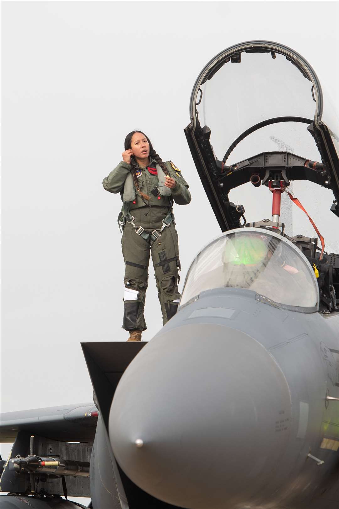 Weapon Systems Officer Captain Gianna-Rose Acosta of the United States Air Force’s (USAF) 48th Fighter Wing, stationed at RAF Lakenheath in Suffolk, prepares for take off in an F-15E Strike Eagle at RAF Coningsby in Lincolnshire. (Joe Giddens/ PA)