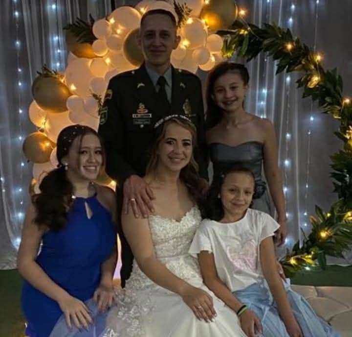 Luisa Rodriguez and husband Eduardo on their wedding day, with their daughters, Maria, Alejandra and Paula.