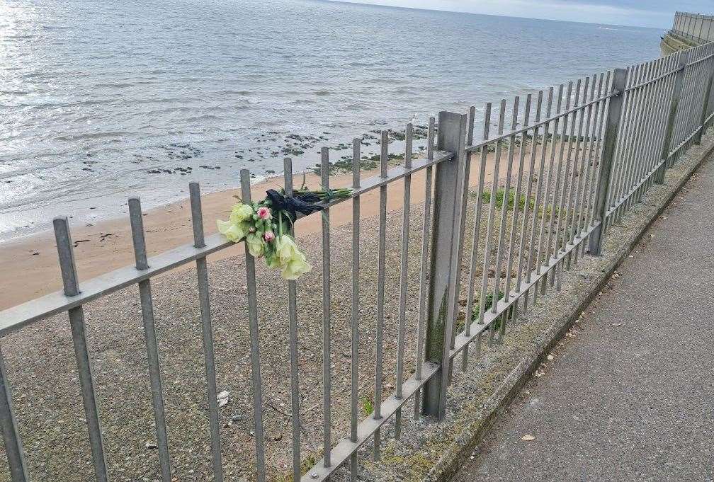 Flowers have been left at the scene of the tragedy