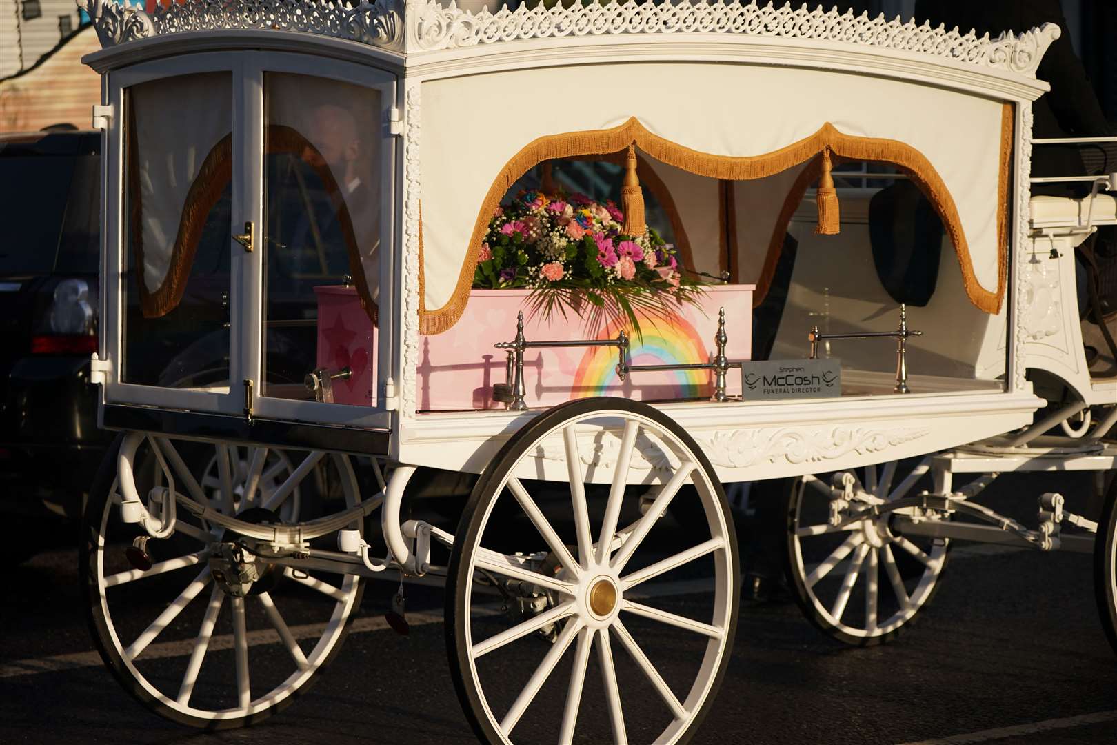 The horse-drawn carriage carrying the coffin of Stella-Lily McCorkindale (Niall Carson/PA)