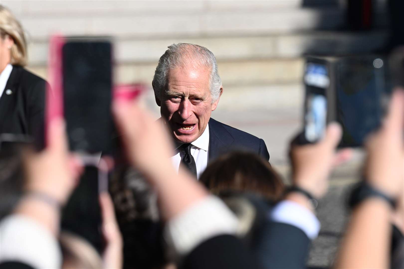 King Charles III greets well wishers outside St Anne’s Cathedral (Michael Cooper/PA)