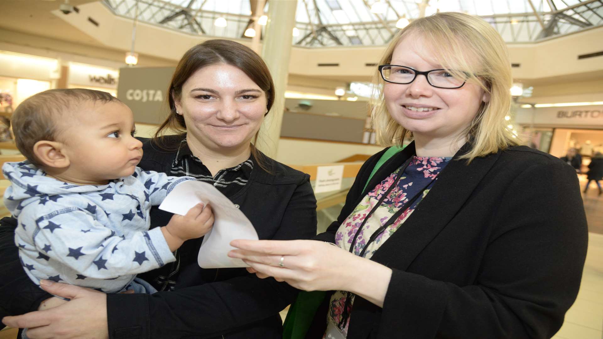 Roman, 8 months, and mum Kelly Matthews talk with Hempstead Valley's marketing manager Su Button