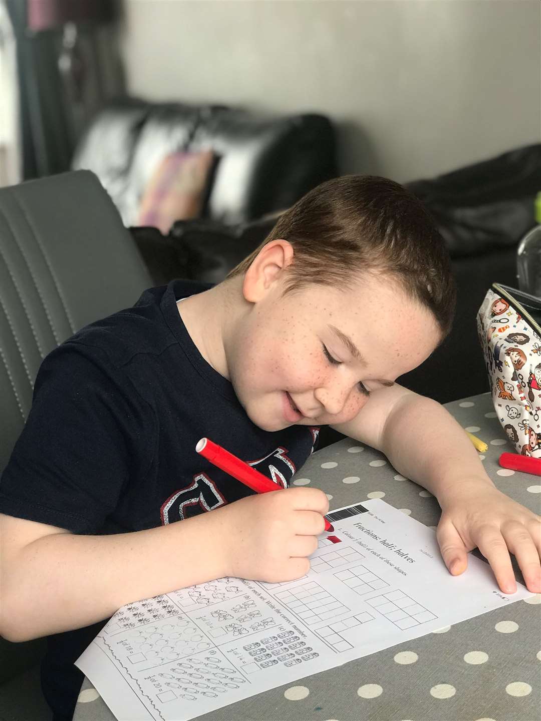 David McKenna doing some school work while shielding (McKenna family/PA)