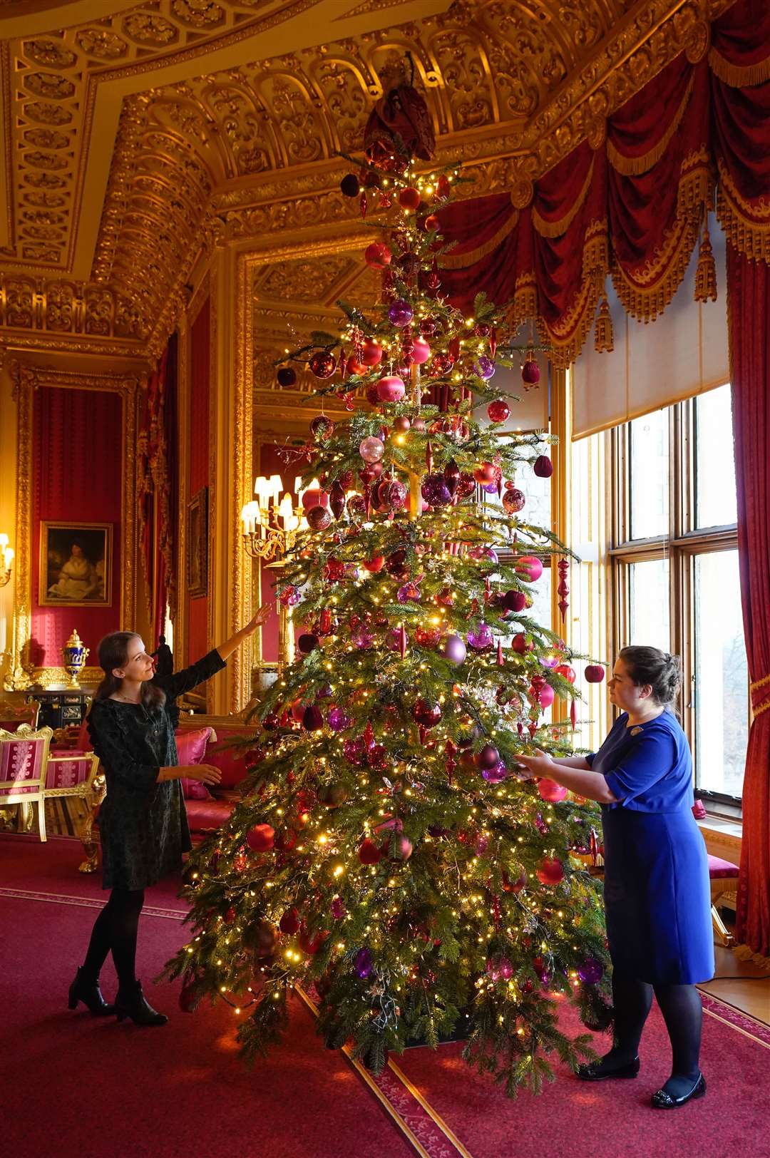 A room often used by the late Queen for private events, the Crimson Drawing Room has views of the Berkshire countryside. It was devastated by a fire in 1992 before being refurbished (Andrew Matthews/PA)