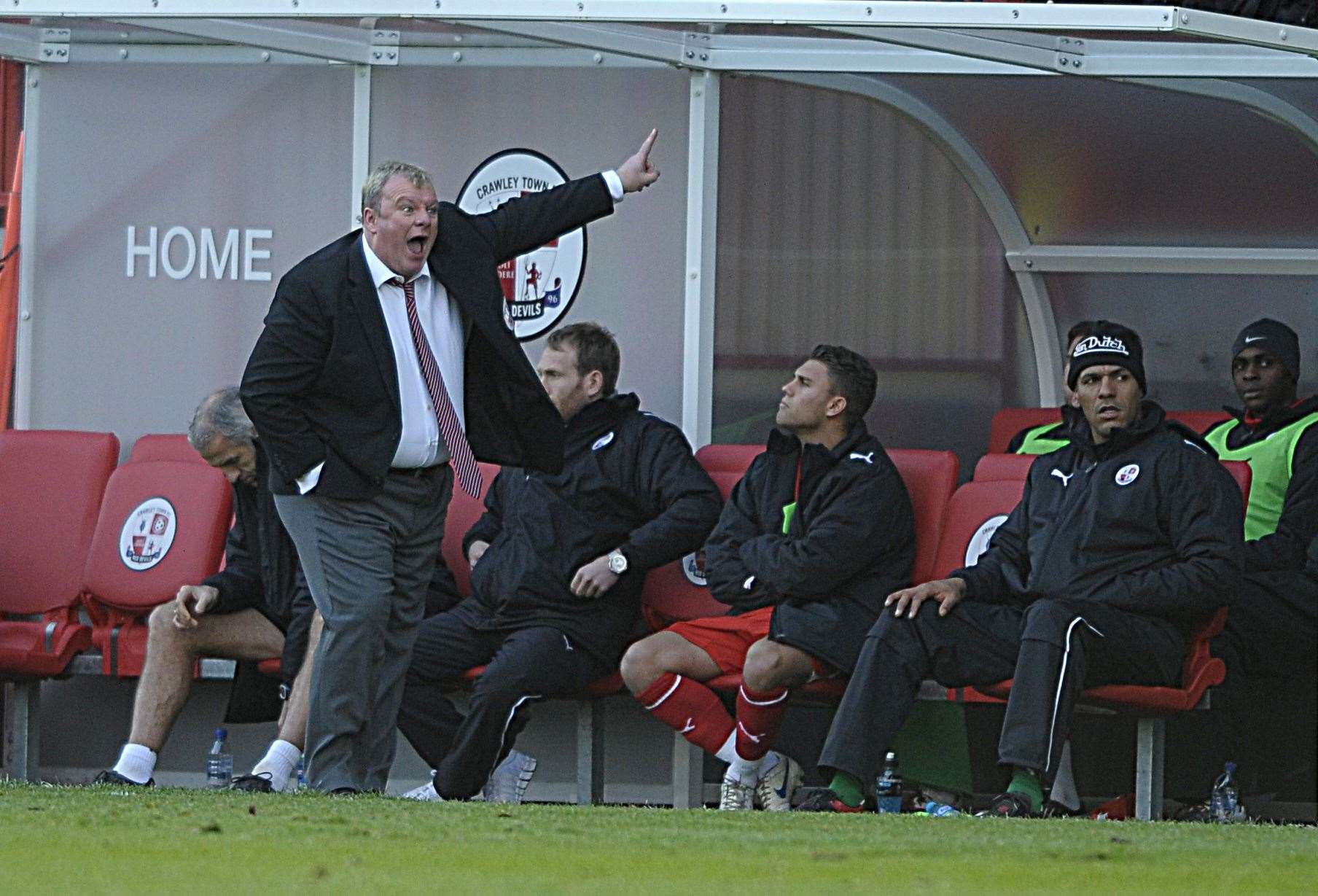 Steve Evans argues with Gills' former boss Andy Hessenthaler during a heated game at Crawley Town Picture: Barry Goodwin